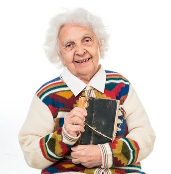 elderly woman flipping an old book isoalted on white background
