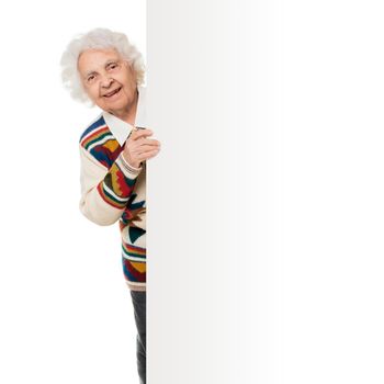 elderly woman alongside of ad board over white background