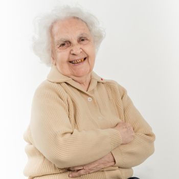 portrait of smiling elderly woman with grey hair