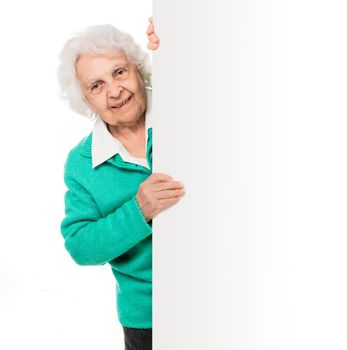 elderly woman alongside of ad board over white background