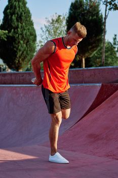 man doing exercises outdoors in the park. High quality photo