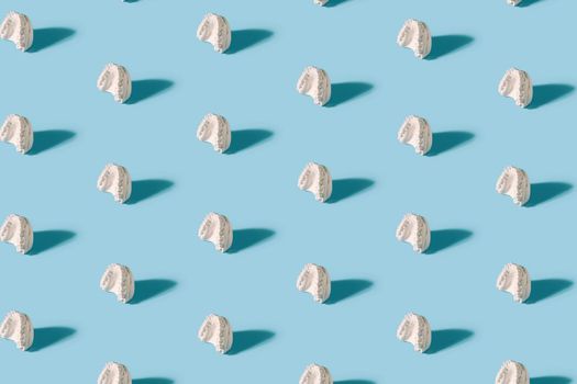Minimal concept.Trendy braces pattern made with various braces on bright light blue background.