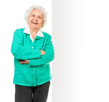 elderly woman alongside of ad board over white background