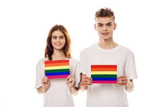 young couple lgbt Flag transgender lifestyle light background. High quality photo