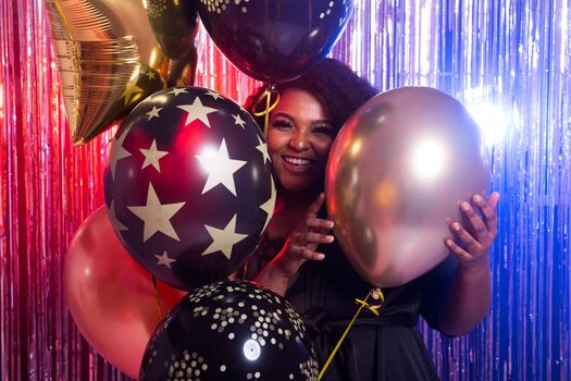 Beautiful black woman enjoying a party lifestyle. Birthday party, clubbing and holidays.