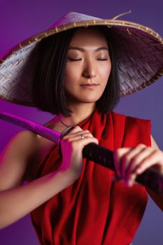 the portrait of an Asian woman in a red cape and an Asian hat with a katana in her hand image of a samurai with his eyes closed