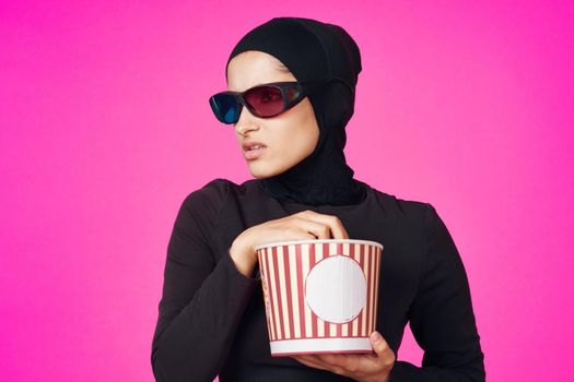 arab woman entertainment cinema popcorn fashion isolated background. High quality photo