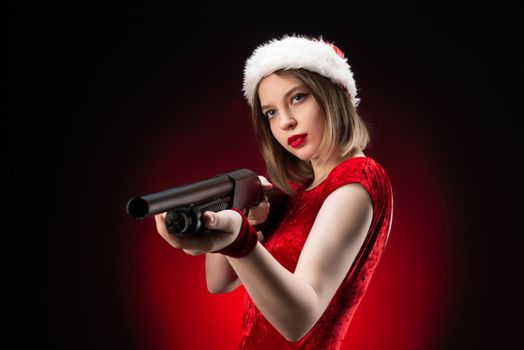 girl in a red bodysuit and a Santa Claus hat with a shotgun in her hands for Christmas