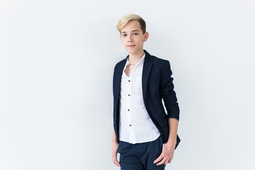 Teenage boy portrait on a white background.