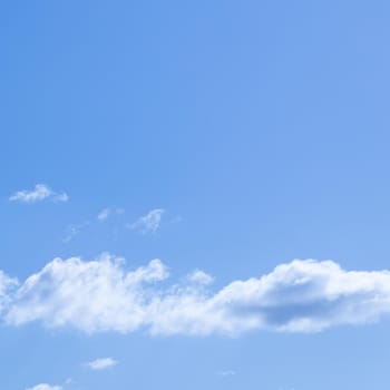 Background of blue sky with white clouds.