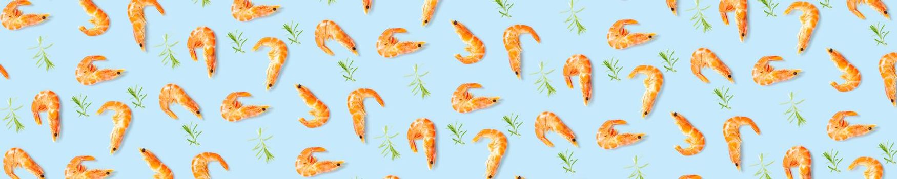 Tiger shrimp. Seafood background made from Prawns isolated on a blue backdrop. modern flat lay background from boiled shrimps, Seafood. not seamless pattern