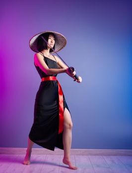 the slender Asian woman an Asian hat with a katana in her hand image of a samurai