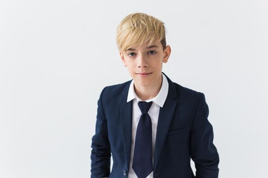 Teenage boy portrait on a white background.