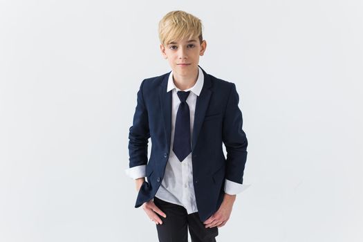 Teenage boy portrait on a white background.