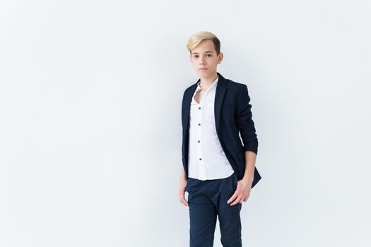 Teenage boy portrait on a white background.