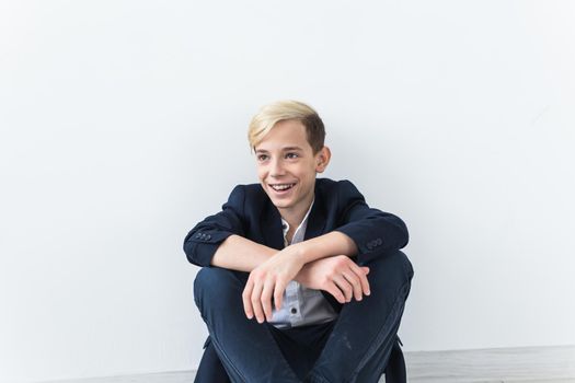 Attractive eleven year old boy with braces on his teeth. Dentistry and teenager