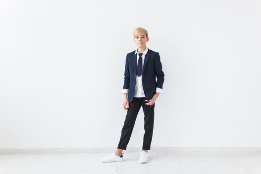 Teenage boy portrait on a white background.