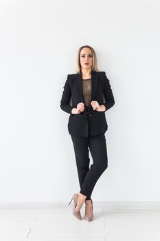 Sexy business woman posing on white.