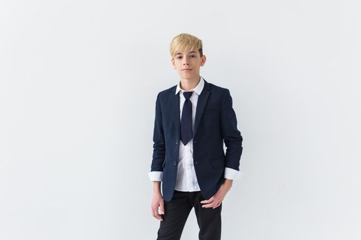 Teenage boy portrait on a white background.