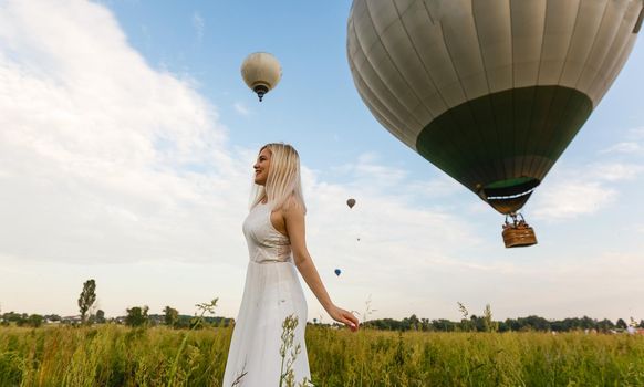 woman and a hot air balloon, summer