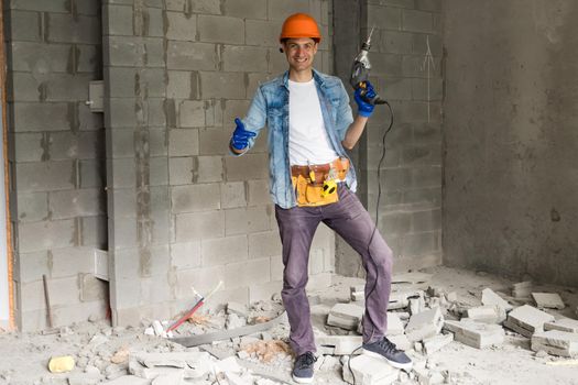 Handyman with a tool belt. House renovation service.