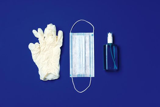 Face mask, medical gloves and sanitizer. Coronavirus covid-19 prevention concept