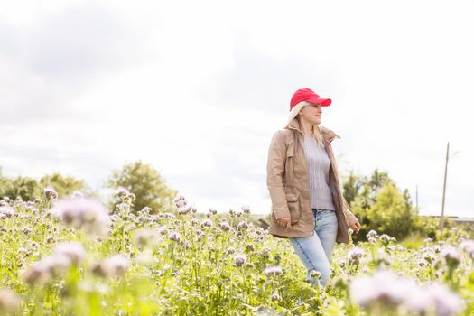 Portrait of beautiful girl in field