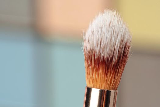 Make-up palette and brushes. Professional eyeshadow palette. Close up.