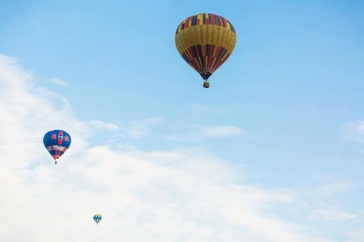 hot air balloon over blue sky. Composition of nature and blue sky background