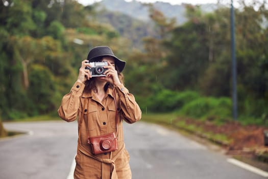 Beautiful young female caucasian tourist in equatorial africa jungles