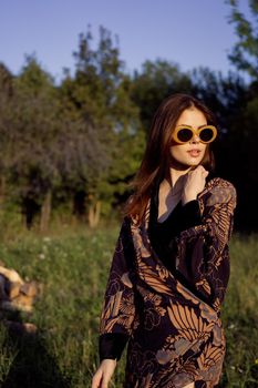 fashionable woman in sunglasses outdoors summer glamor. High quality photo