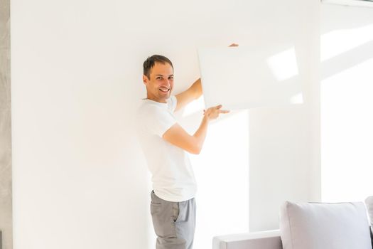 man with canvas mockup. Photo Mockup. The man hold canvas. For canvas design.