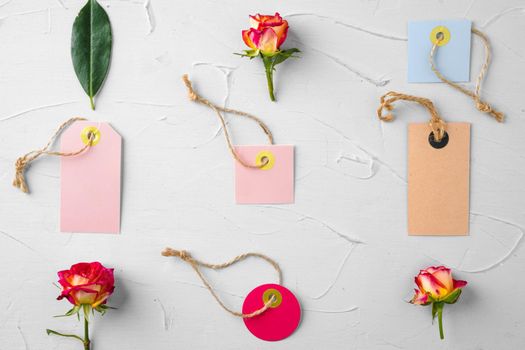 Flowers and blank paper tag. Sending flowers. High quality photo