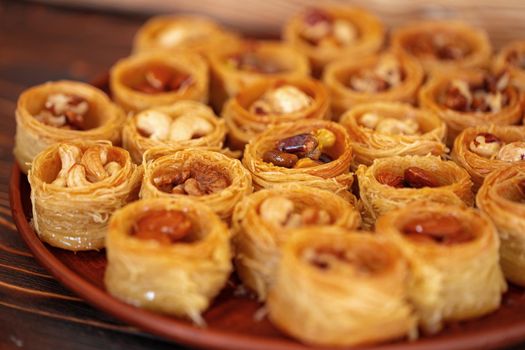 Turkish baklava dessert with honey, close up photo