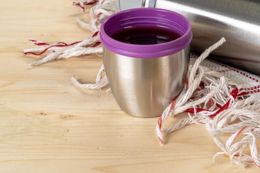 Aluminum metal thermos container bottle on table