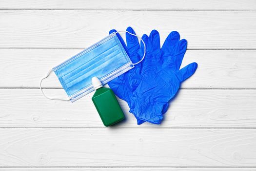 Face mask, medical gloves and sanitizer. Coronavirus covid-19 prevention concept