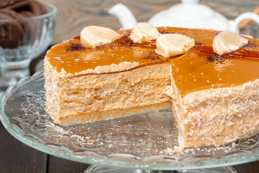 Plate with delicious caramel cake
