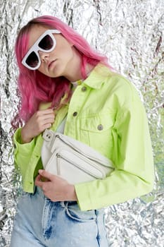 fashionable woman pink hair posing fashion clothes lifestyle fun design. High quality photo