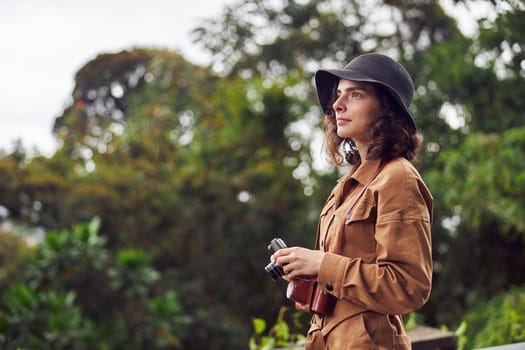 Beautiful young female caucasian tourist in equatorial africa jungles