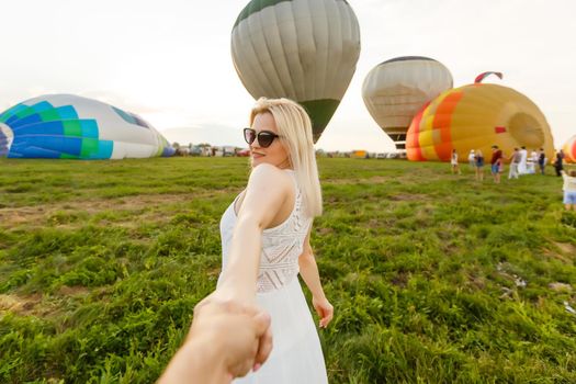 Amazing view with woman and air balloon. Artistic picture. Beauty world. The feeling of complete freedom