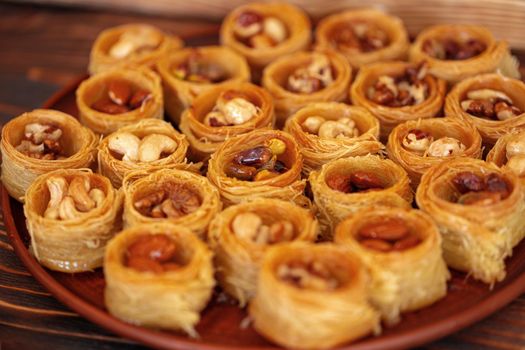 Turkish baklava dessert with honey, close up photo