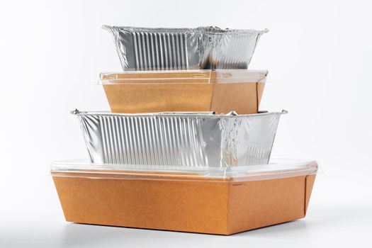 Assortment of food delivery containers on white background close up