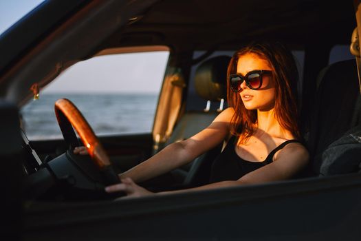 woman driving in car trip posing fashion travel. High quality photo