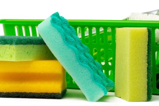 Cleaning items in basket isolated on white background, close up