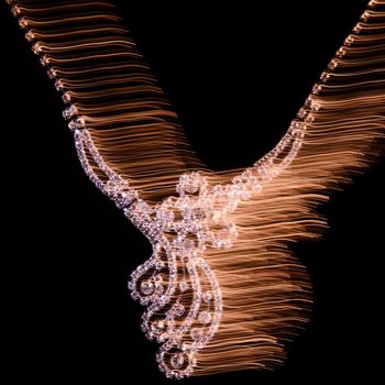 Nice Jewelry. Necklace. mixed light. black background.