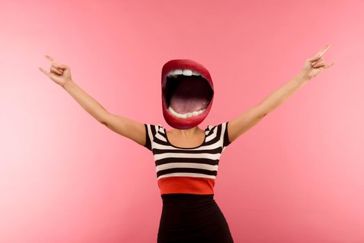 Stylish fashion sexy bad crazy girl with an open mouth instead of a head. Red lips. Dangerous rocky emotional woman. Pink background