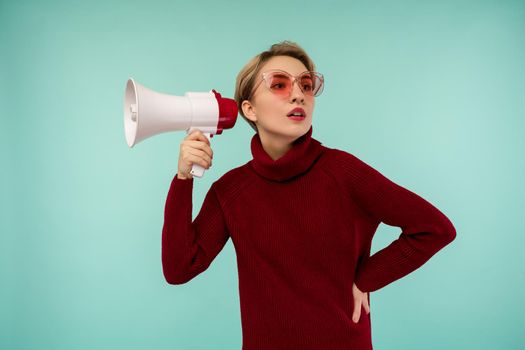 Funny young brunette woman girl in red suit posing isolated on pastel blue wall background studio portrait. People sincere emotions lifestyle concept. Mock up copy space. - image