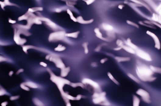 Close up texture of water under the influence of vibration in 432 hertz - image