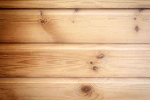 Brown wooden plank wall background texture, retro design soft light colors closeup