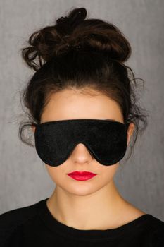 Gorgeous young woman with black sleep mask - Image